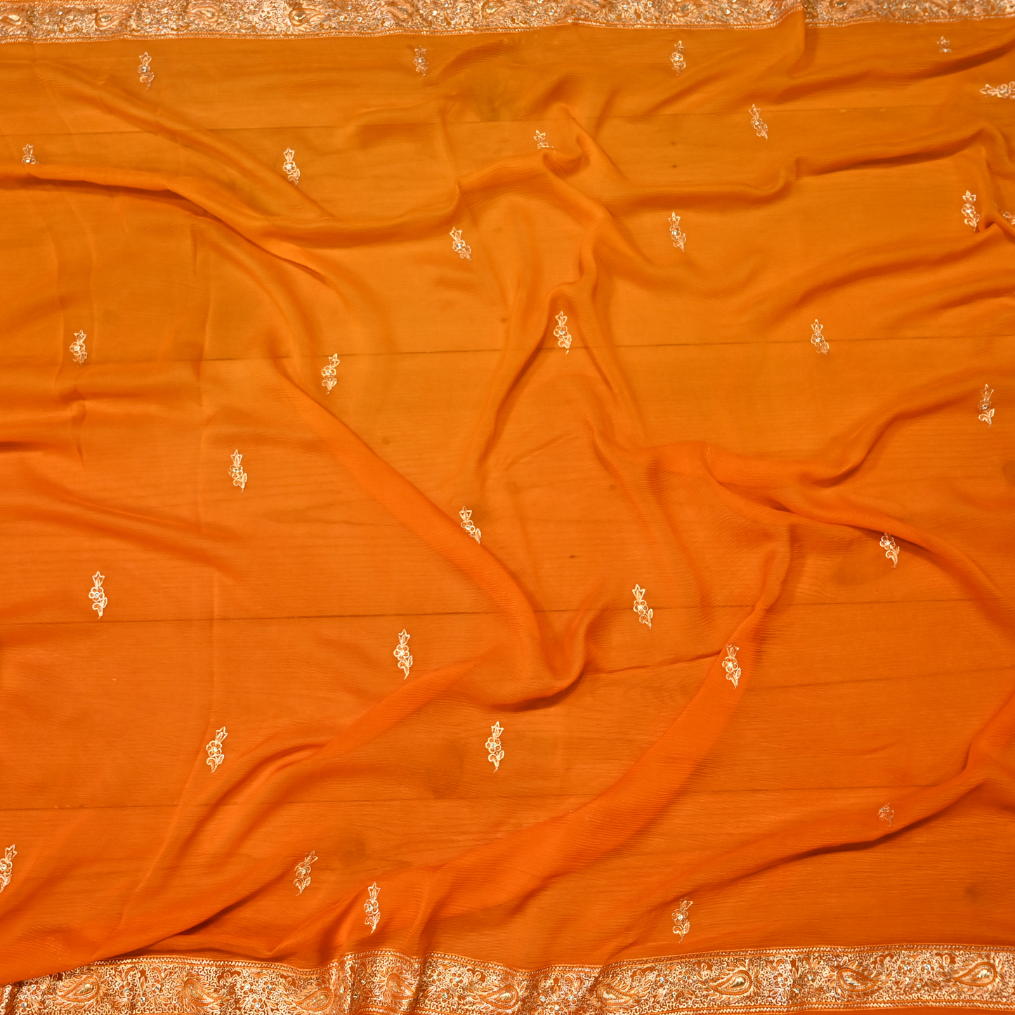 VIBRANT MARIGOLD ORANGE PURE PLATINUM CHIFFON SAREE WITH AARI ZARDOZI WORK BORDER