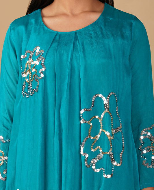 (DELIVERY IN 20 DAYS) TEAL CHINON SEQUIN EMBROIDERED SHORT KURTI WITH PANTS (SUIT)