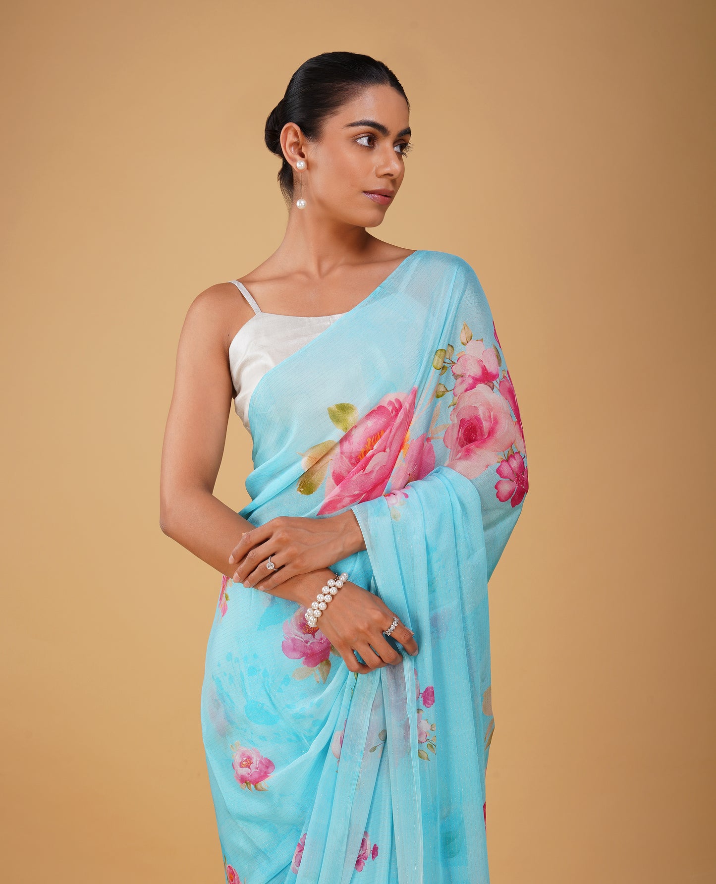 CAPRI BLUE PRINTED CHINON SAREE WITH THIN ZARI WEAVE AND PLAIN CREPE BLOUSE