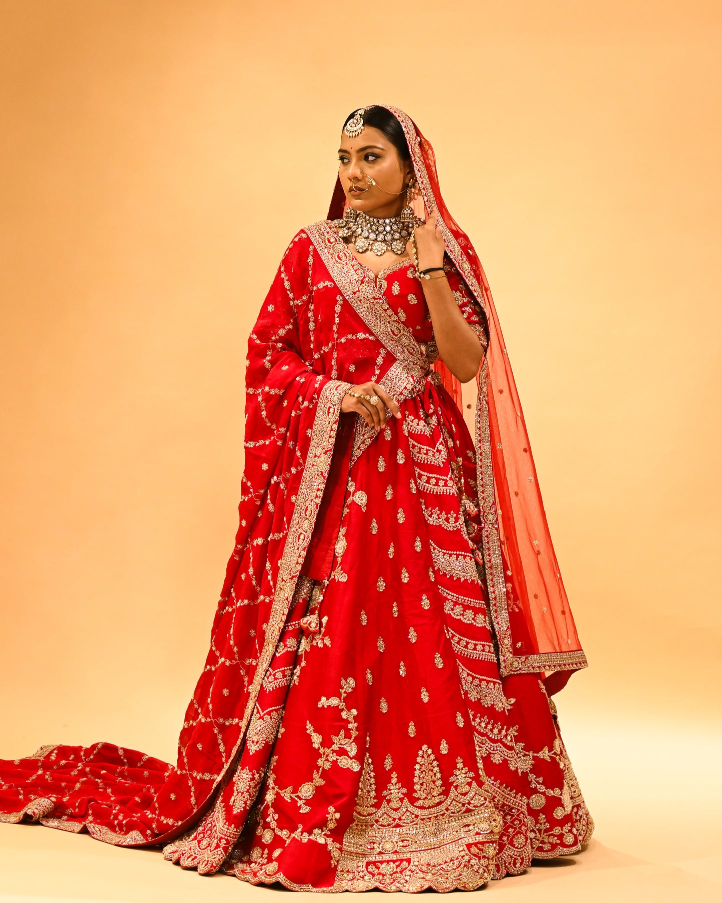 RED BRIDAL WEDDING LEHENGA WITH THREE-PANEL DESIGN, 6-METER FLAIR, DOUBLE DUPATTA, POTLI & EMBROIDERED TASSELS