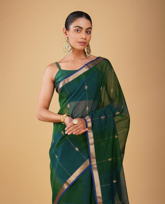 BOTTLE GREEN-BLUE SHADED MAHESHWARI SAREE WITH DIAMOND DRILL BORDER & ZARI STRIPES BLOUSE
