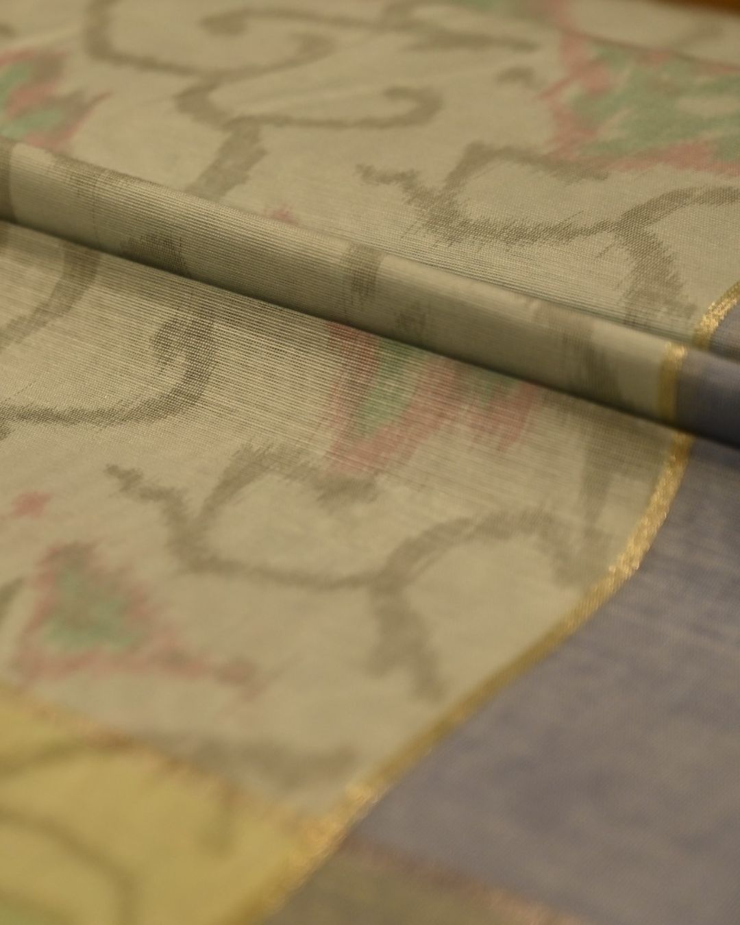 DUSTY AQUA BLUE COLOUR POWERLOOM CHANDERI SAREE WITH IKAT WEAVE PATTERN AND CONTRAST BORDER