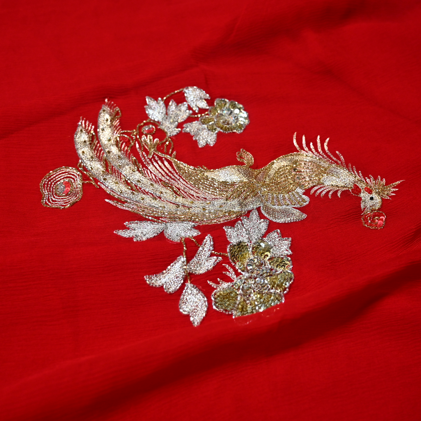 RED COLOUR PURE PLATINUM CHIFFON SAREE WITH AARI EMBROIDERED BIRD MOTIFS