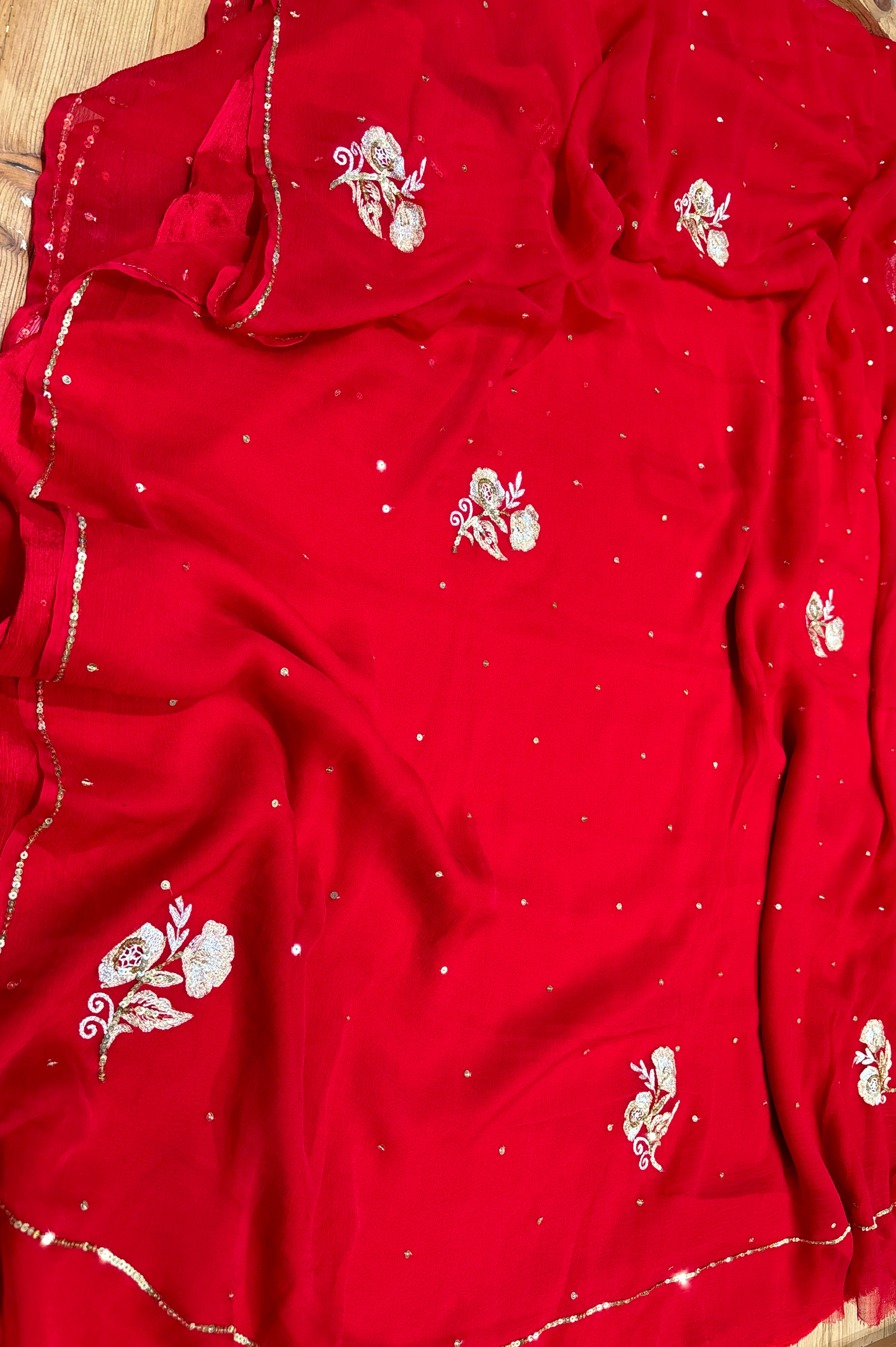 RED CHIFFON SAREE WITH AARI SEQUINS EMBROIDERY AND CUT WORK JAALI MOTIFS