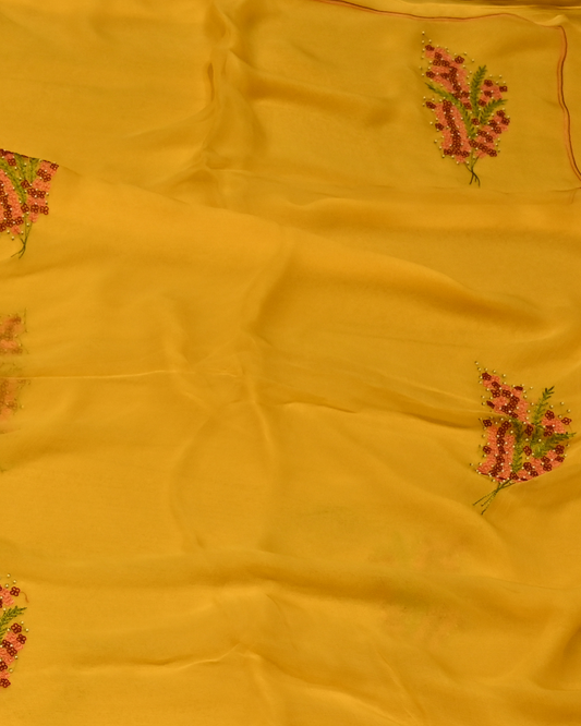 MULTI COLOUR RESHAM EMBROIDERED MOTIFS IN MUSTARD COLOUR PLANT BASED CHIFFON SAREE