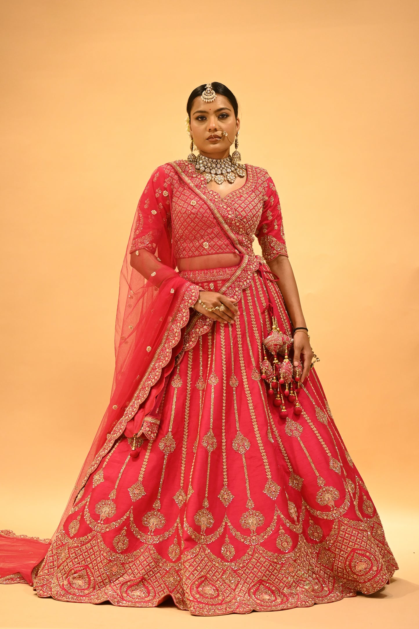 RANI HAND-EMBROIDERED BRIDAL LEHENGA WITH READYMADE BLOUSE, NET DUPATTA & EMBROIDERED TASSELS