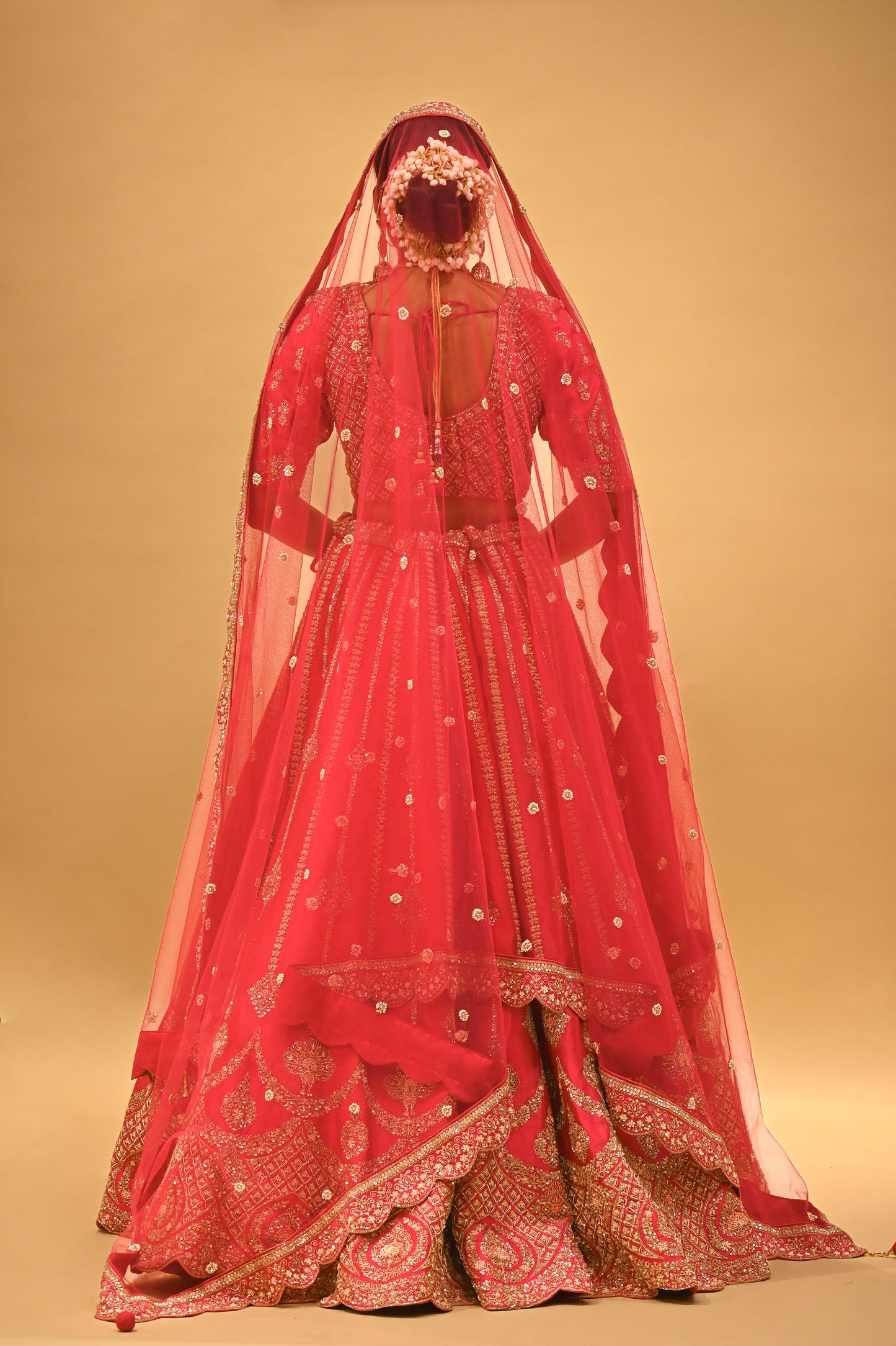 RANI HAND-EMBROIDERED BRIDAL LEHENGA WITH READYMADE BLOUSE, NET DUPATTA & EMBROIDERED TASSELS