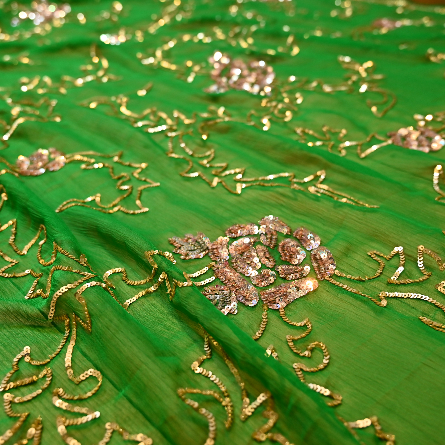 (DELIVERY IN 30 DAYS) GREEN PURE PLATINUM CHIFFON SAREE WITH GOLDEN SEQUINS JAAL WORK