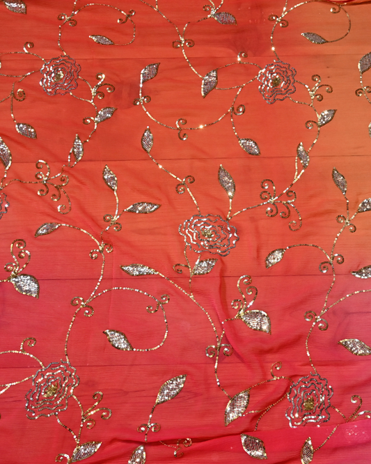 ( DELIVERY IN 20-25 DAYS ) CORAL PINK COLOUR SAREE FEATURING SILVER-GOLDEN SEQUIN JAAL WITH AARI JAALI WORK