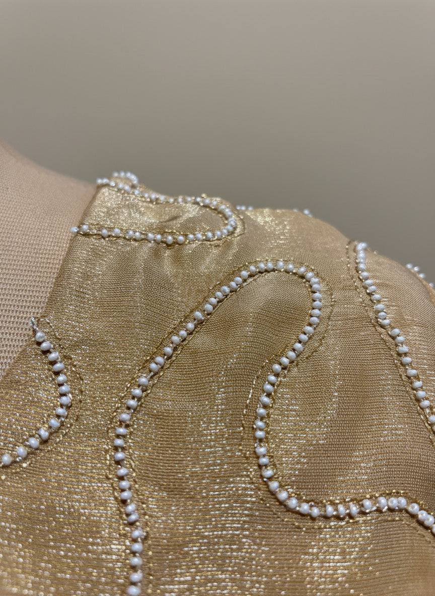 GOLDEN TISSUE PEARL-WORK KURTA WITH GOLDEN TISSUE PLAIN LEHENGA & EMBROIDERED TASSELS BY SIDDHAIKA