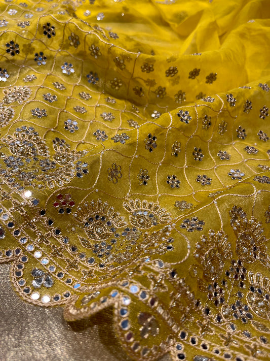 BRIGHT YELLOW PURE SILK MIRROR WORK EMBELLISHED UNSTITCHED SUIT WITH CREPE SILK BOTTOM & ORGANZA DUPATTA