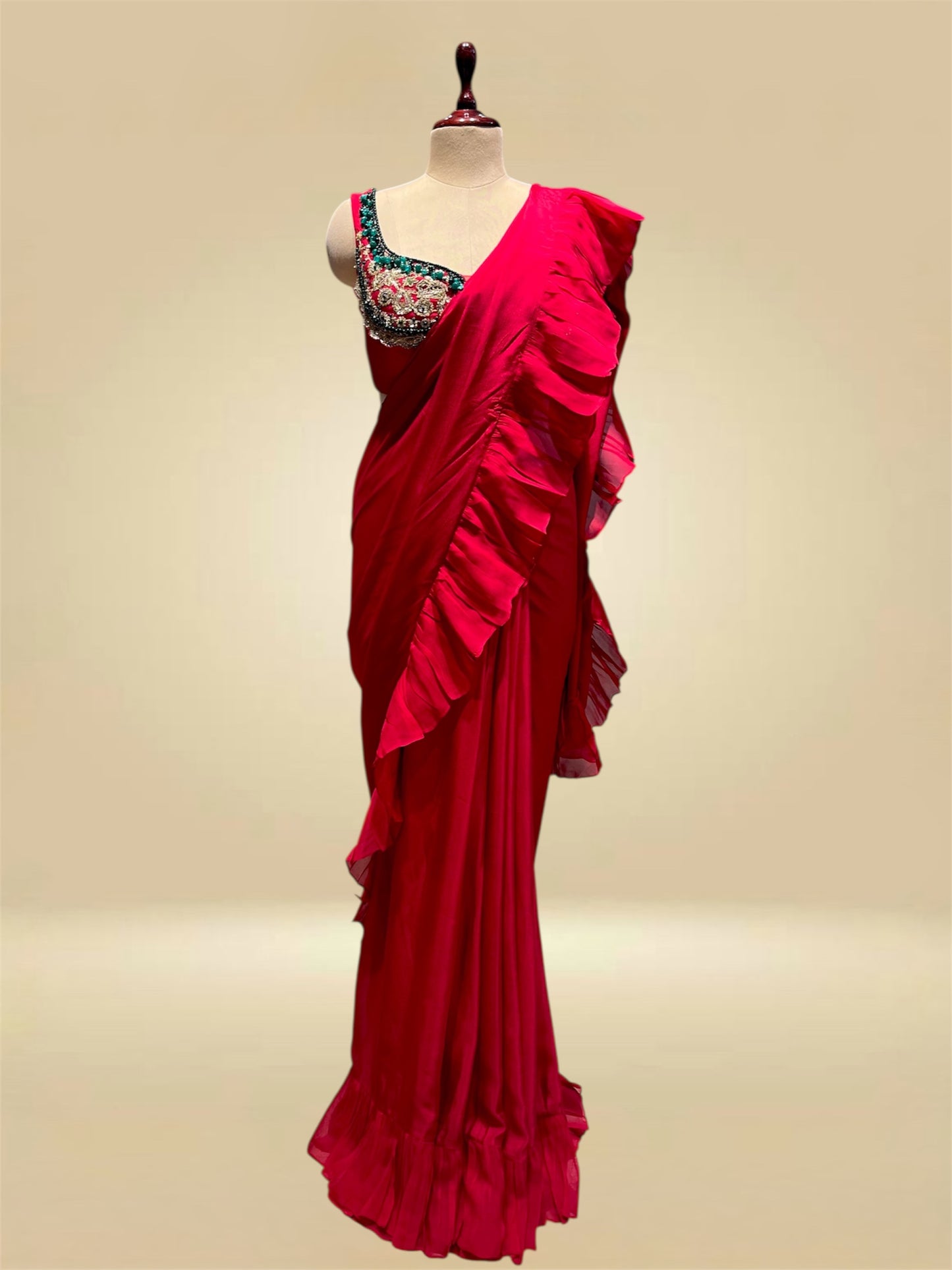 RASPBERRY COLOUR CHINON RUFFLE SAREE WITH READYMADE BLOUSE EMBELLISHED WITH SEQUINS & PITTA WORK