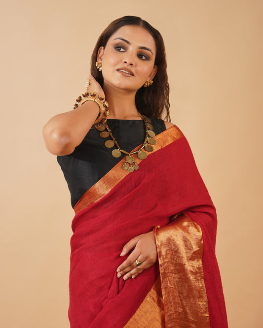 RED HANDWOVEN LINEN SAREE WITH GOLDEN DRILL WEAVE SKIRT BORDER