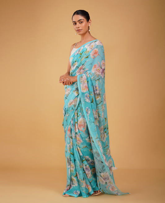 POWDER BLUE FLORAL PRINTED PURE PLATINUM CHIFFON SAREE WITH SELF PRINTED CREPE BLOUSE