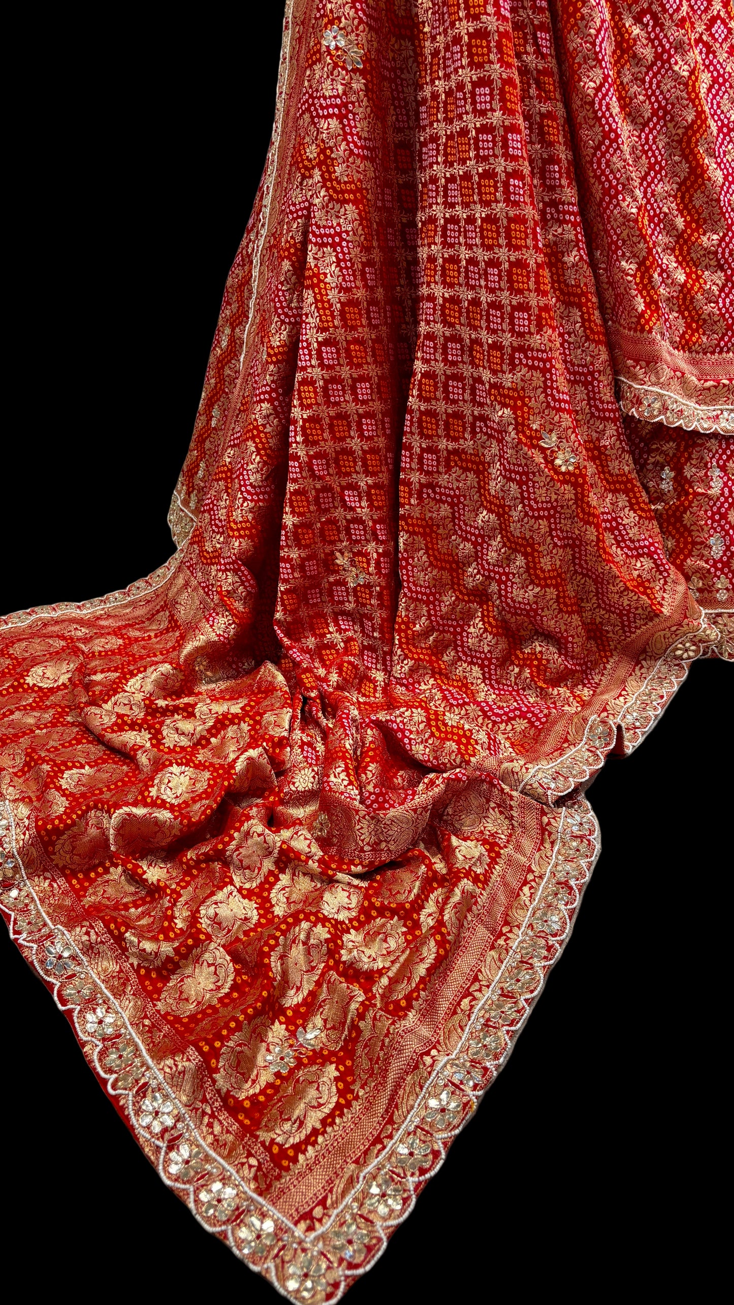 IVORY-RED COLOUR TISSUE GEORGETTE BANDHANI LEHENGA EMBELLISHED WITH GOTA PATTI & ZARDOZI WORK