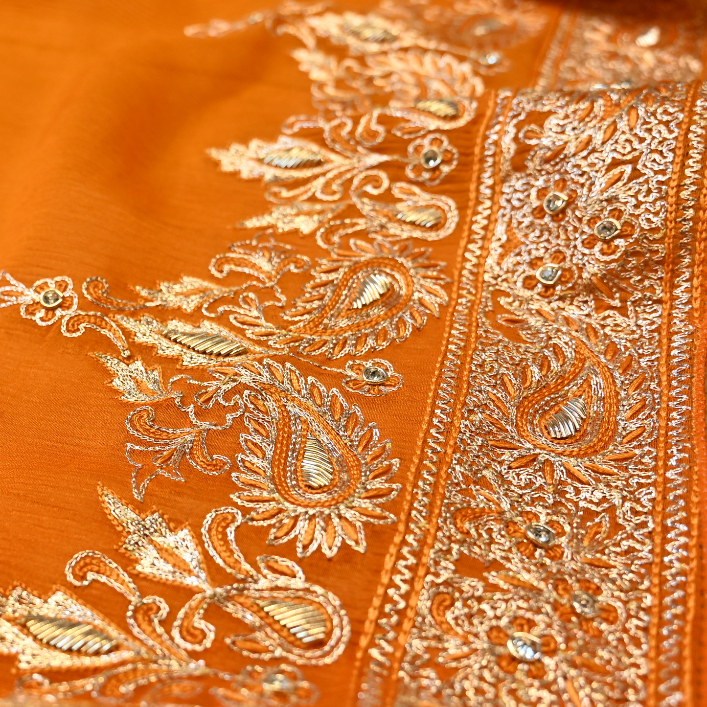 VIBRANT MARIGOLD ORANGE PURE PLATINUM CHIFFON SAREE WITH AARI ZARDOZI WORK BORDER