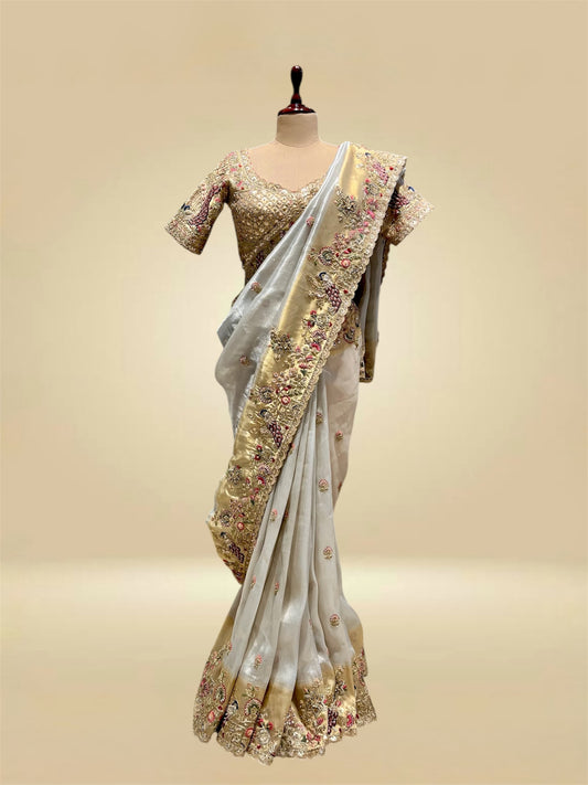 IVORY & GOLD COLOUR TISSUE SAREE WITH KASAB & RESHAM EMBROIDERY, PAIRED WITH A READYMADE BLOUSE