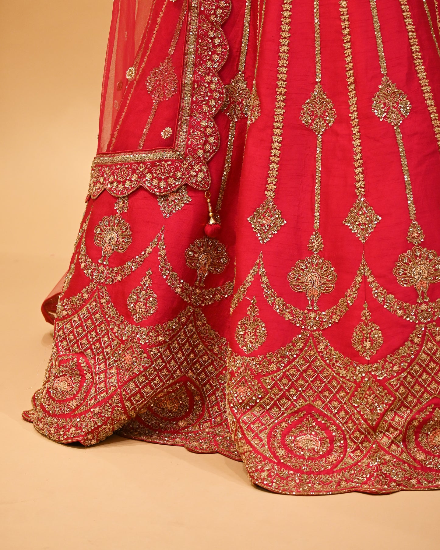 RANI HAND-EMBROIDERED BRIDAL LEHENGA WITH READYMADE BLOUSE, NET DUPATTA & EMBROIDERED TASSELS