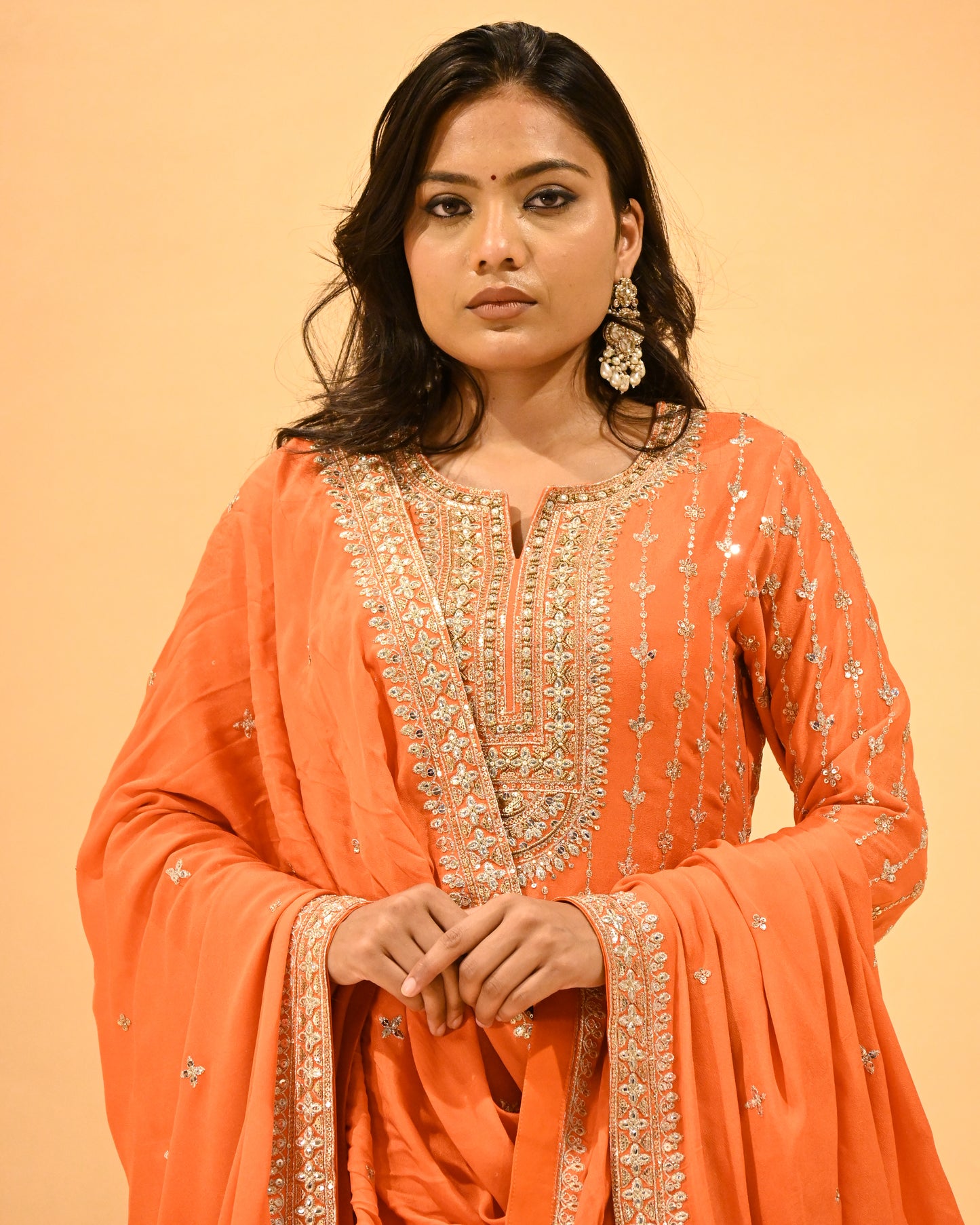 ORANGE EMBROIDERED STRAIGHT KURTA SHARARA SET WITH TASSELED DUPATTA