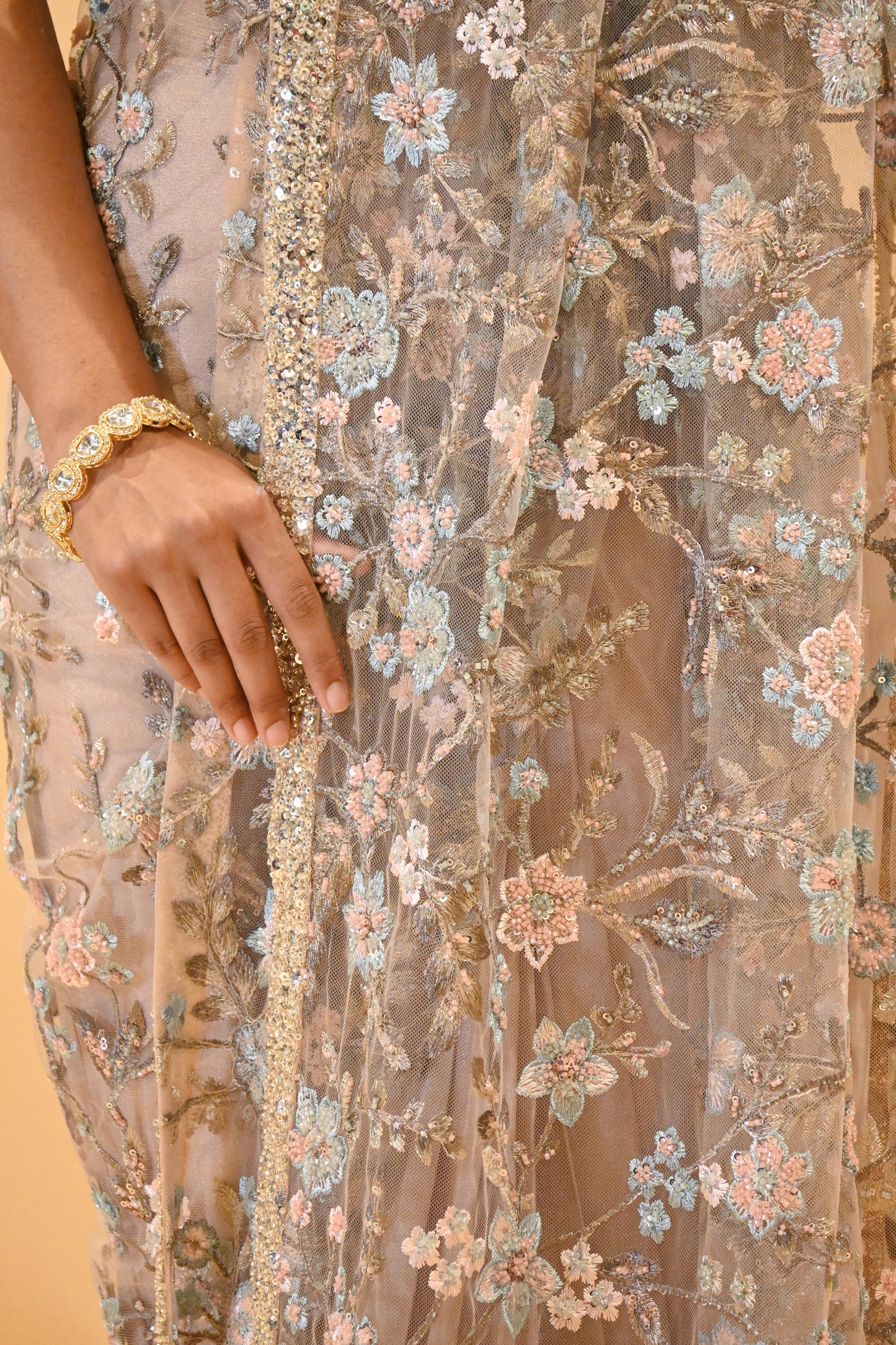 DUSTY ROSE BEIGE COLOUR FLORAL EMBROIDERED NET SAREE