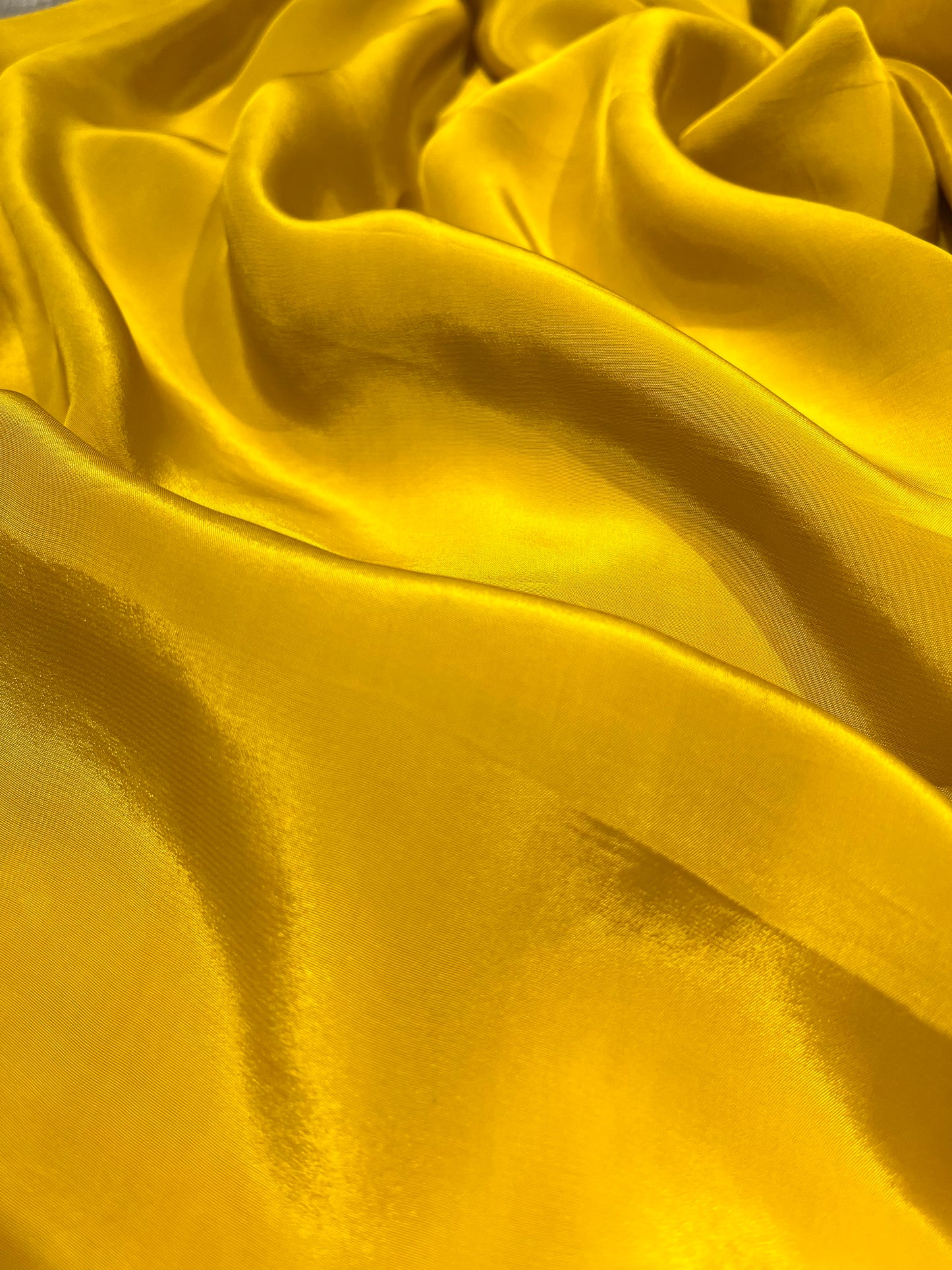 BRIGHT YELLOW PURE SILK MIRROR WORK EMBELLISHED UNSTITCHED SUIT WITH CREPE SILK BOTTOM & ORGANZA DUPATTA