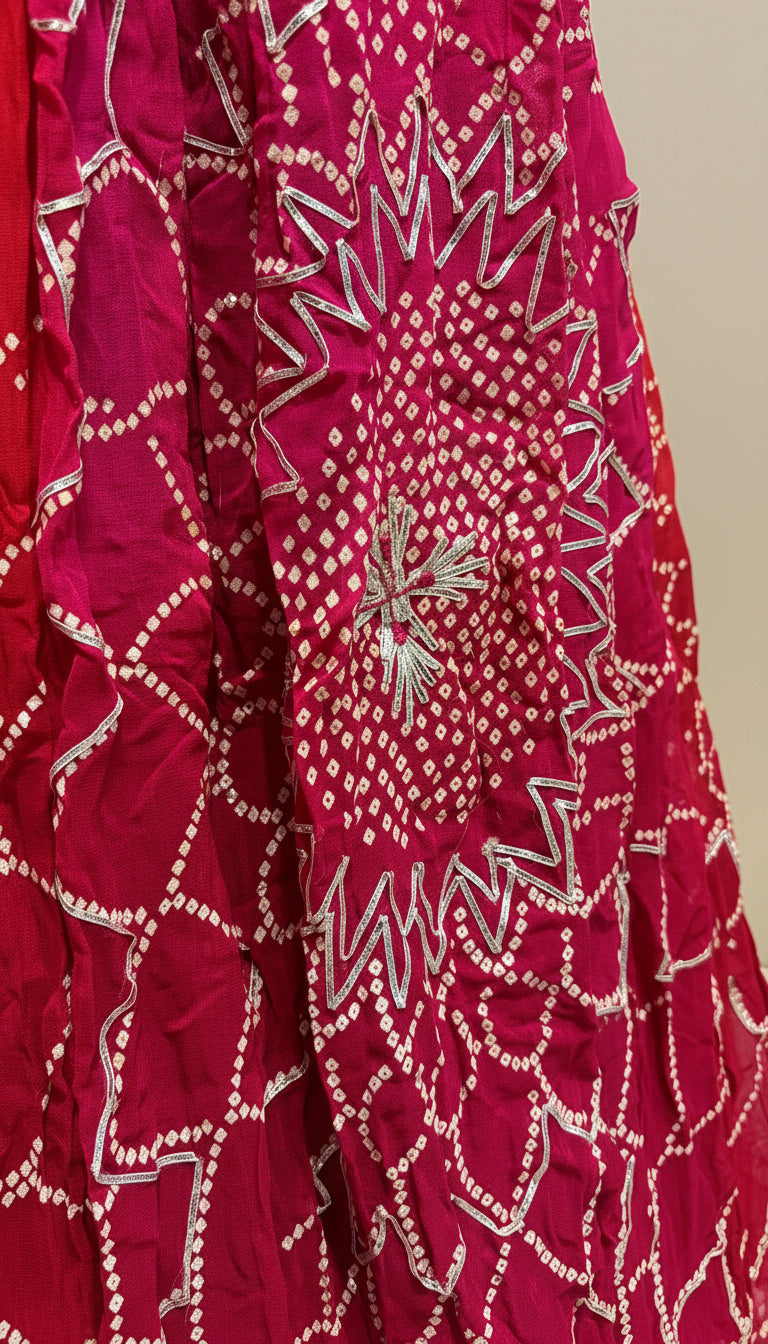 SHADED RED GEORGETTE BANDHANI LEHENGA EMBELLISHED WITH GOTA WORK