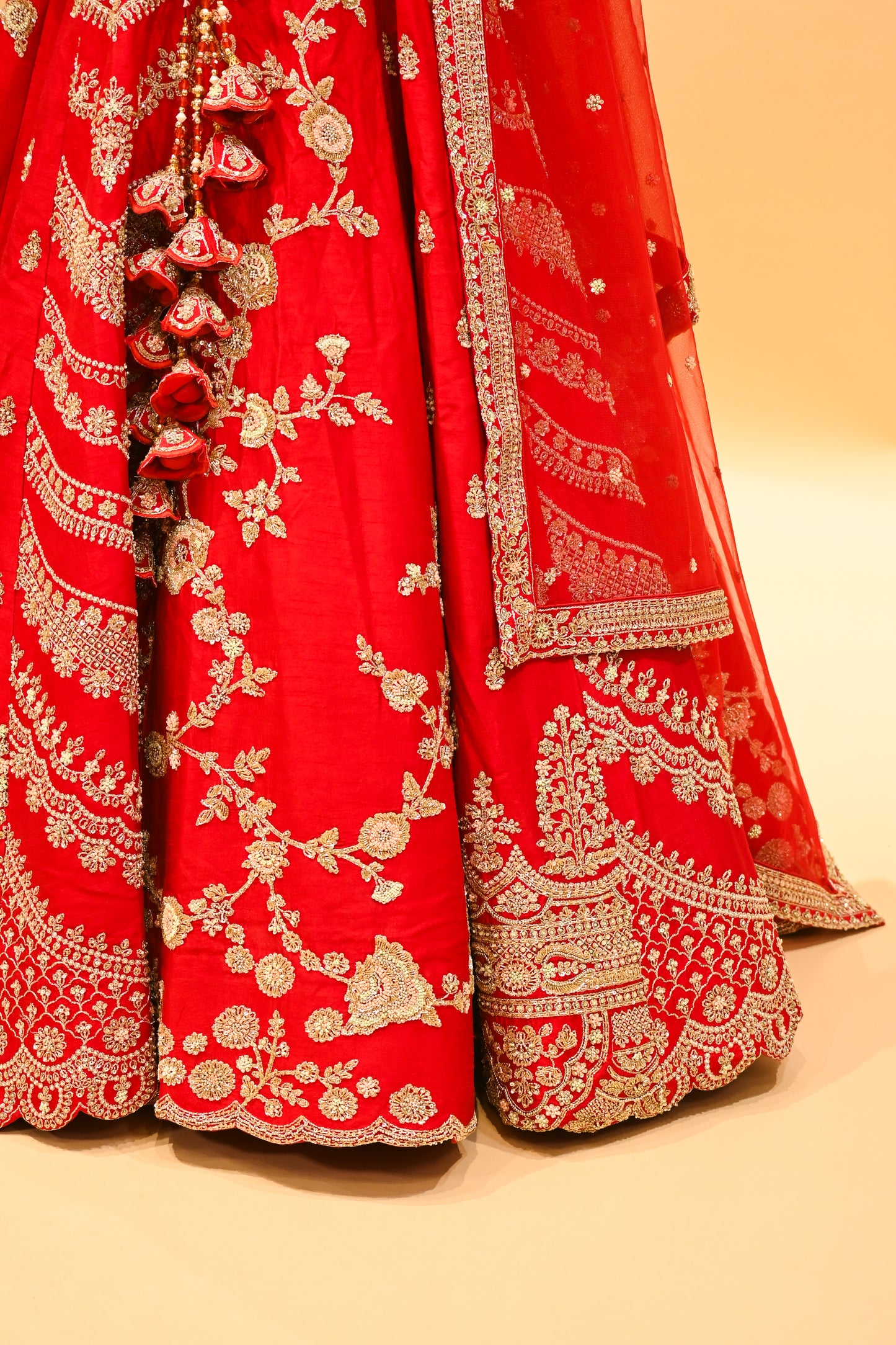RED BRIDAL WEDDING LEHENGA WITH THREE-PANEL DESIGN, 6-METER FLAIR, DOUBLE DUPATTA, POTLI & EMBROIDERED TASSELS