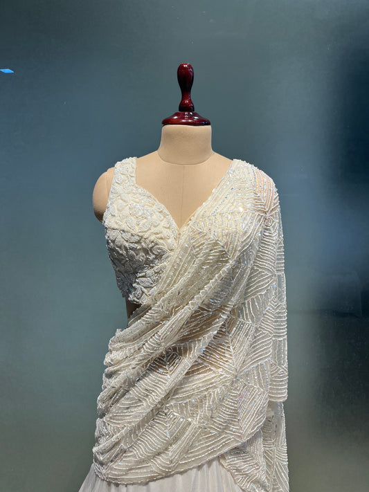 IVORY COLOUR PURE CHINON SKIRT WITH HAND EMBROIDERED BLOUSE EMBELLISHED WITH CUTDANA & SEQUINS WORK