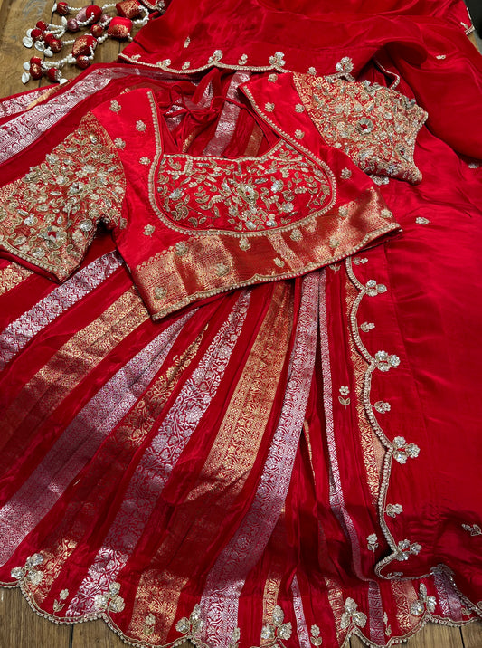 RED COLOUR CREPE SILK ZARI STRIPES LEHENGA WITH EMBROIDERED BLOUSE & SCALLOP DUPATTA EMBELLISHED WITH ZARDOZI, PEARL & CUTDANA WORK - Kothari Sons