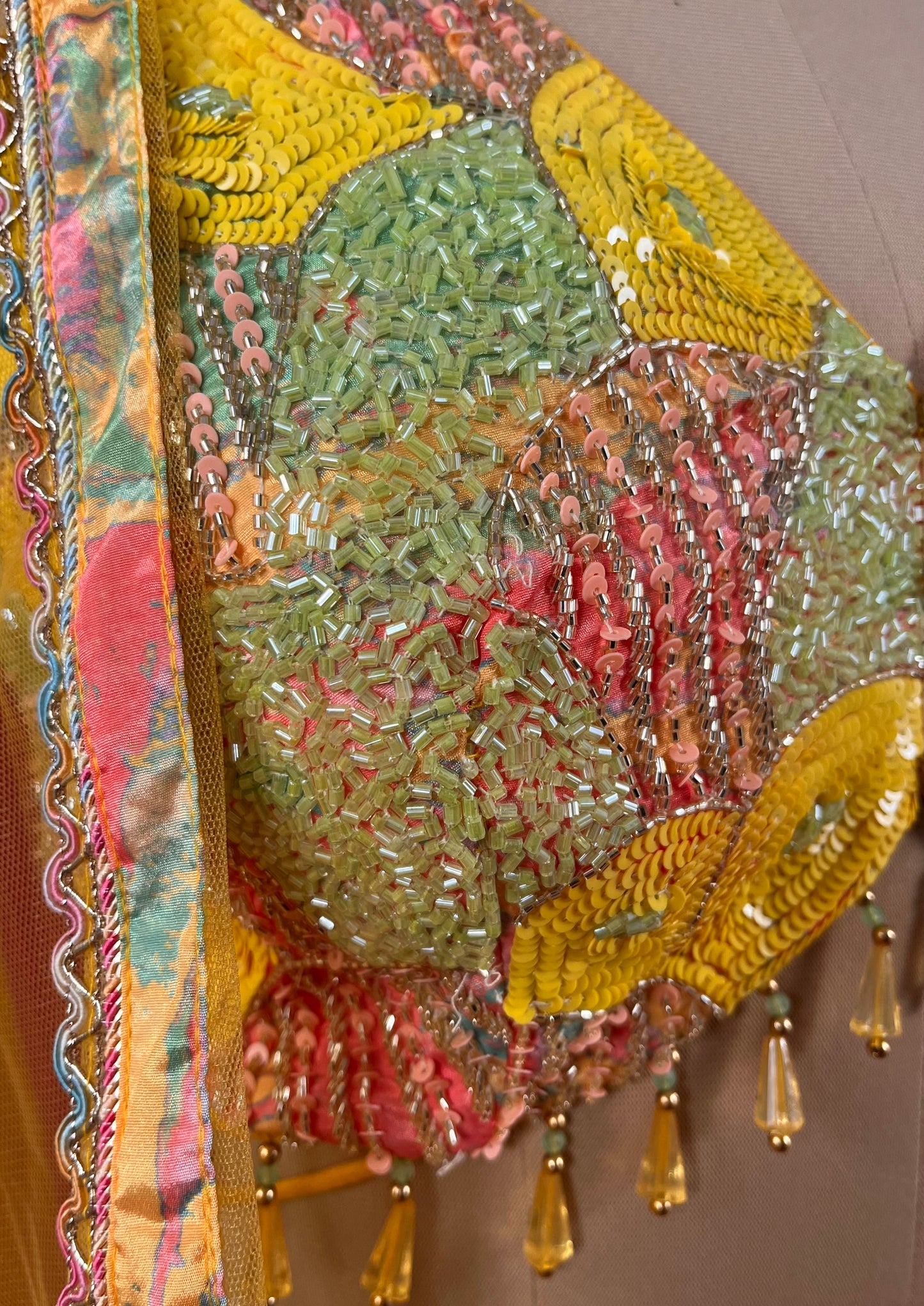 MULTI COLOUR CREPE SILK SEQUINS SKIRT WITH EMBROIDERED BLOUSE & NET DUPATTA EMBELLISHED WITH CUTDANA & SEQUINS WORK