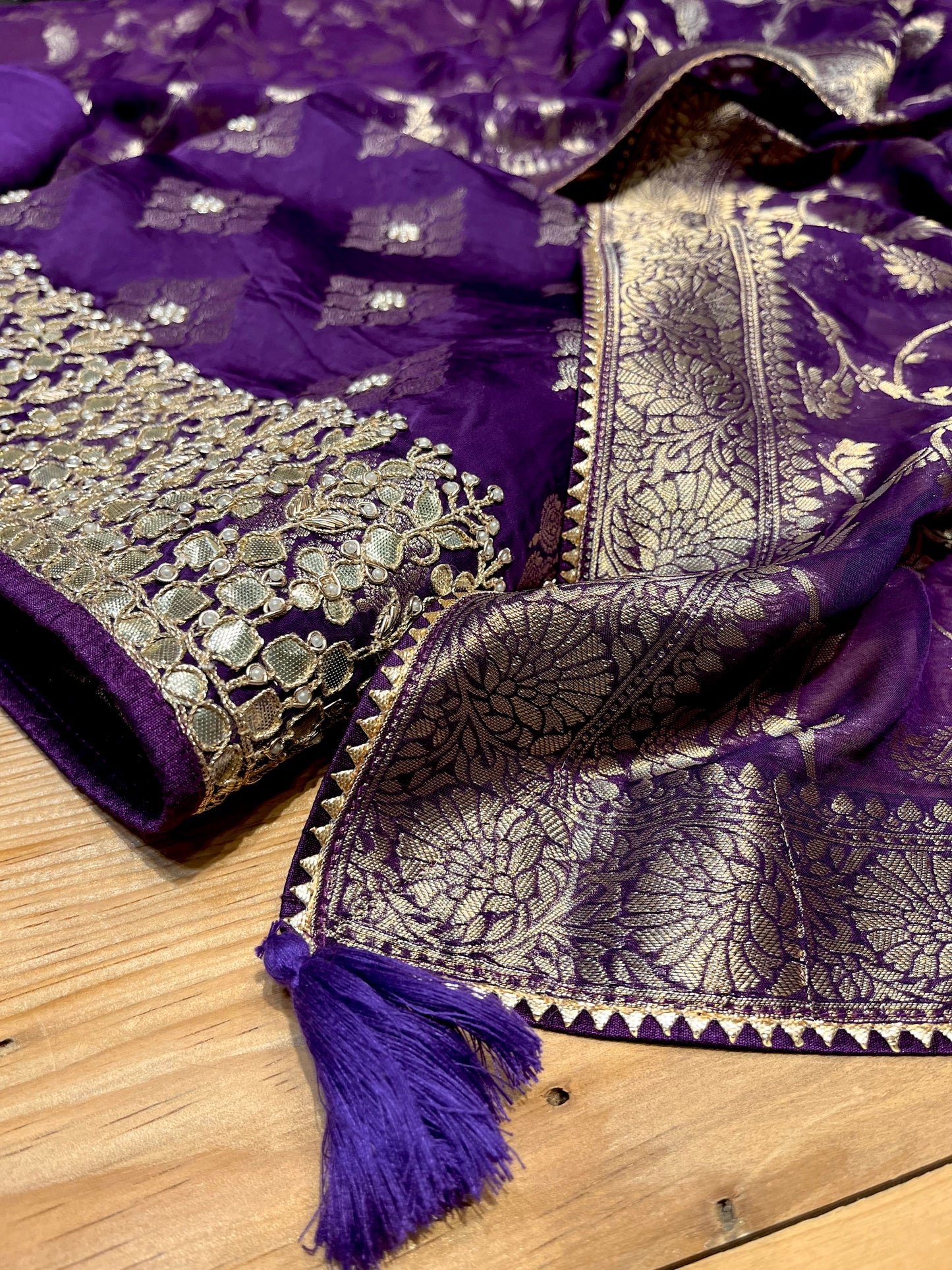 ( DELIVERY IN 15-20 DAYS ) PURPLE COLOUR ORGANZA SILK BANARASI UNSTITCHED SUIT EMBELLISHED WITH GOTA PATTI WORK