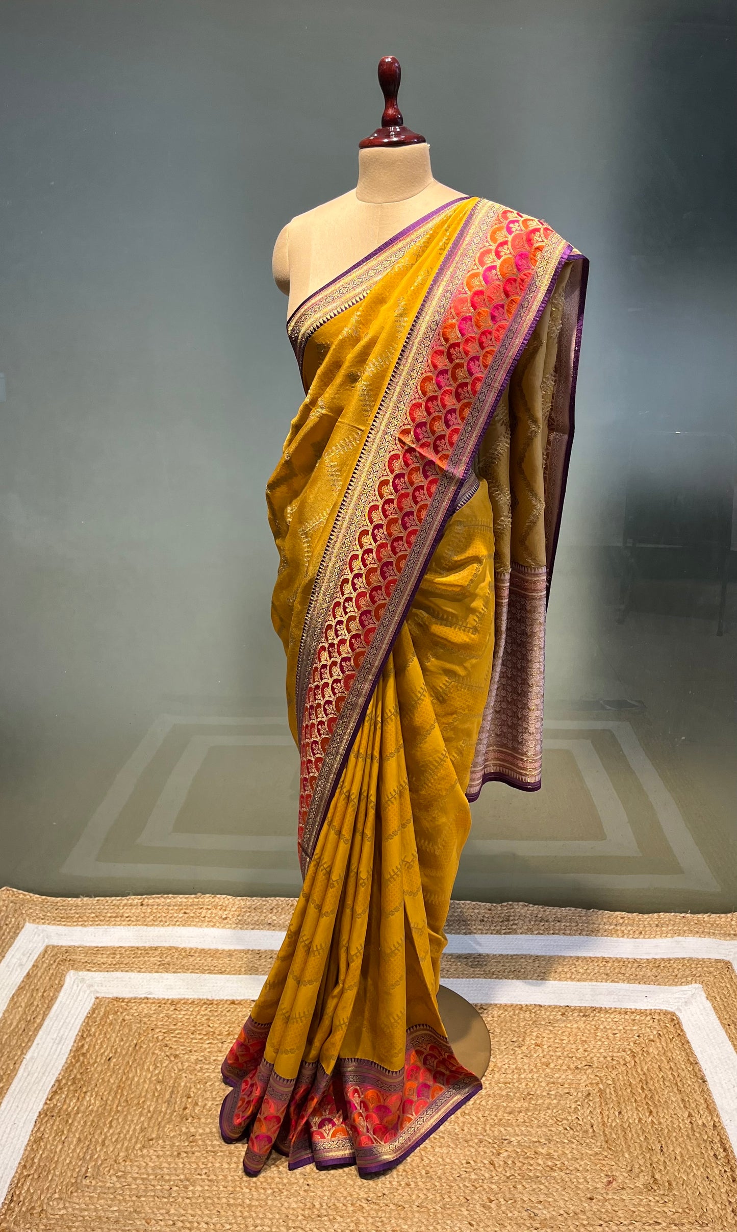 MUSTARD COLOUR GEORGETTE TISSUE SAREE EMBELLISHED WITH ZARI WEAVES