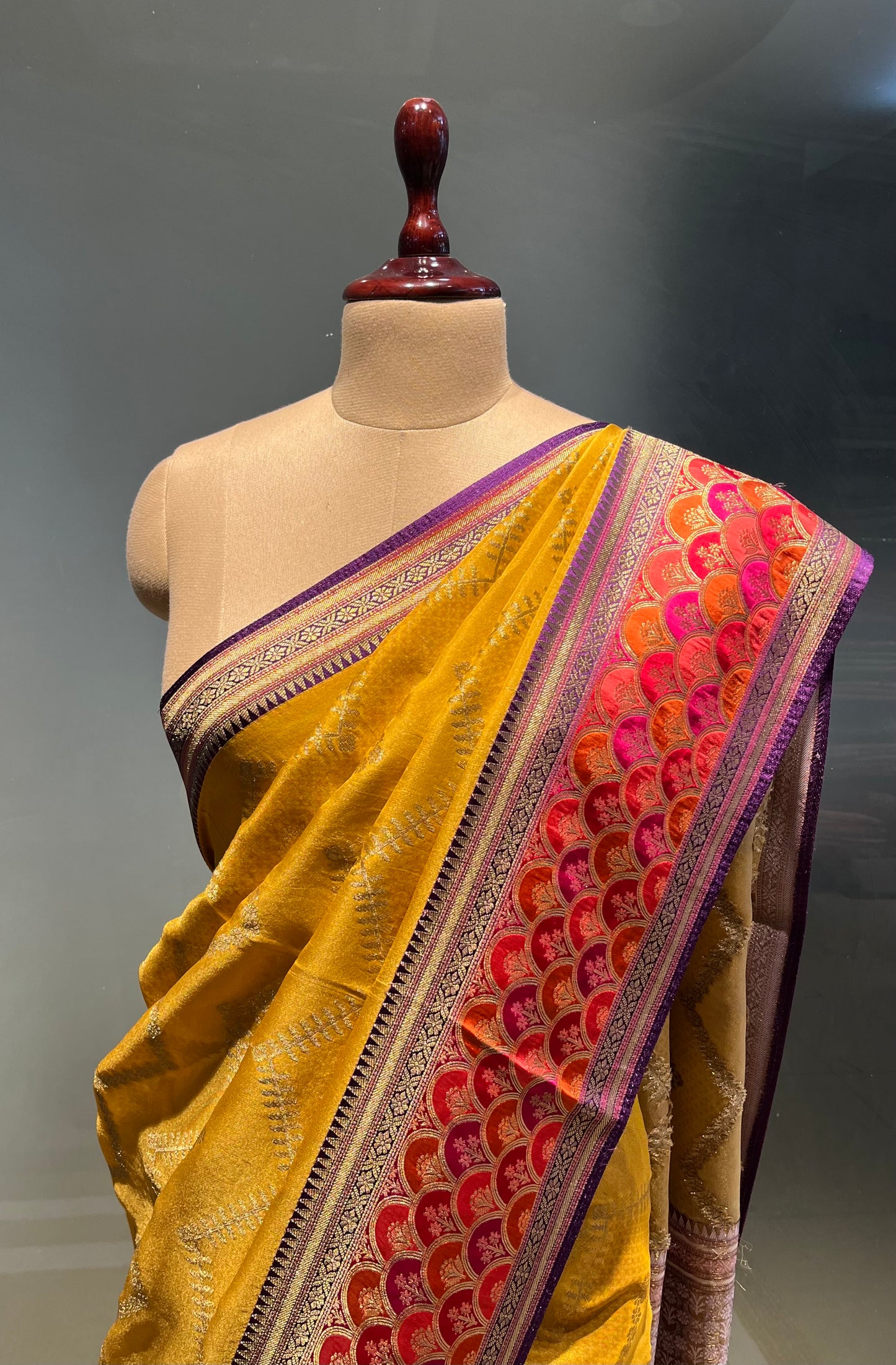MUSTARD COLOUR GEORGETTE TISSUE SAREE EMBELLISHED WITH ZARI WEAVES