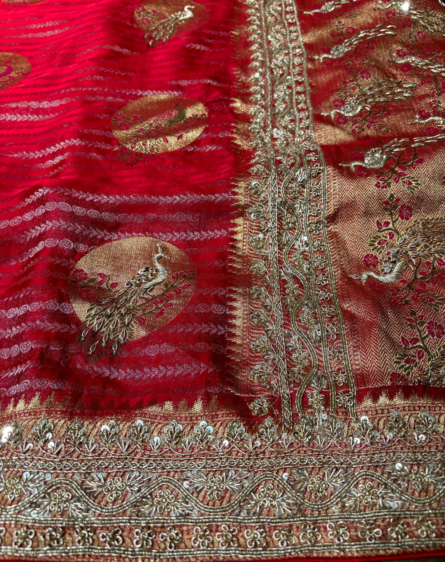(Deliver in 20 Days) RED CREPE TISSUE BRIDAL SAREE WITH ZARDOZI BORDER AND PEACOCK MOTIFS