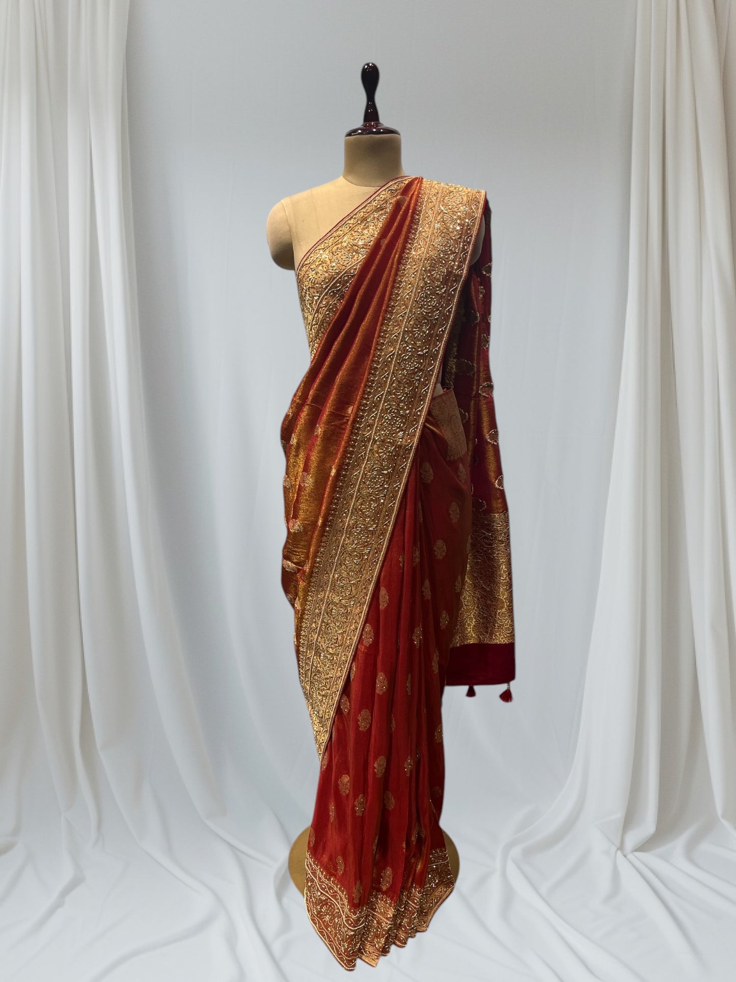 RUST COLOR BANARASI SAREE EMBELLISHED WITH ZARDOZI EMBROIDERY, SEQUINS & PEARL WORK
