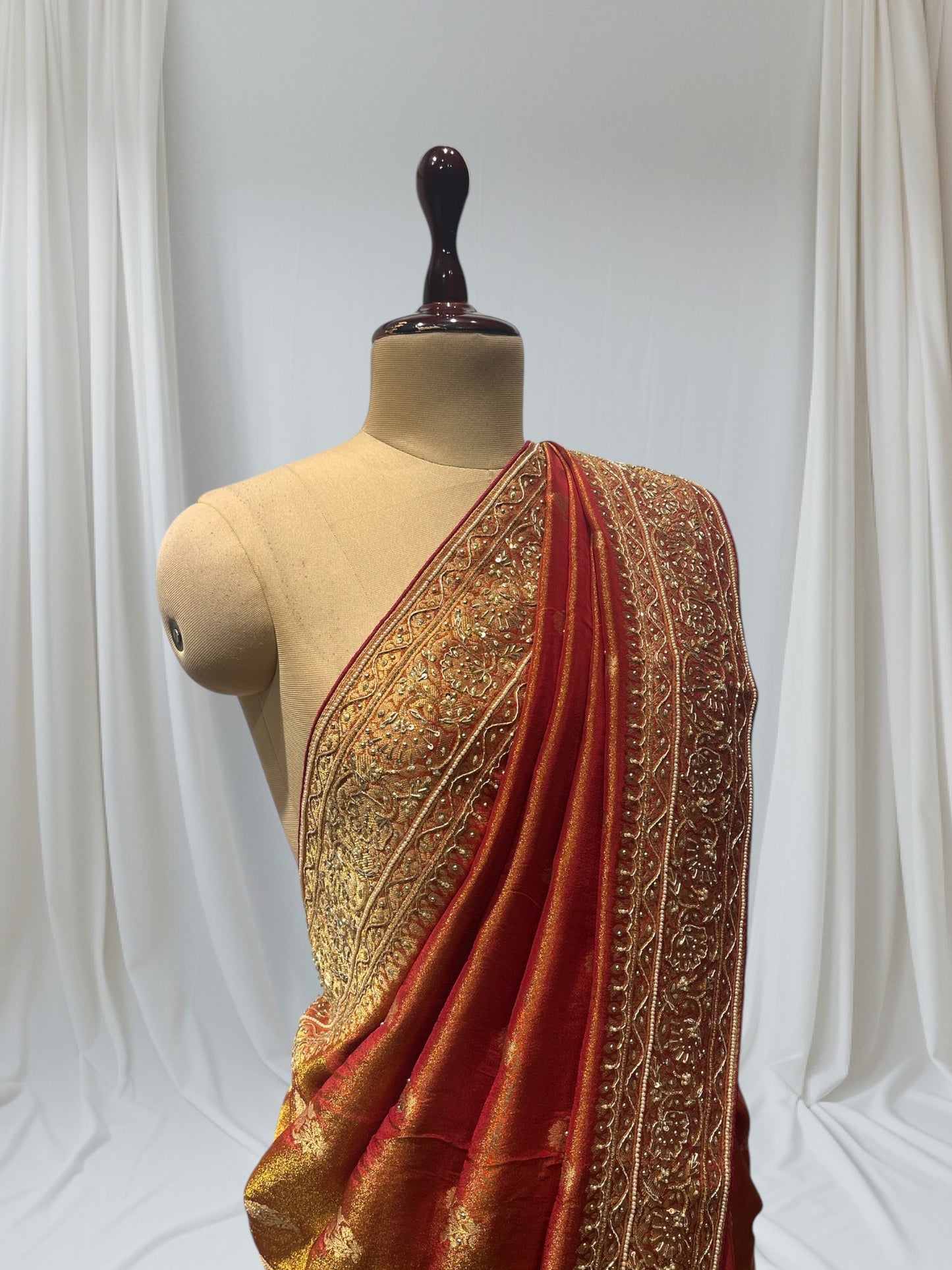 RUST COLOR BANARASI SAREE EMBELLISHED WITH ZARDOZI EMBROIDERY, SEQUINS & PEARL WORK