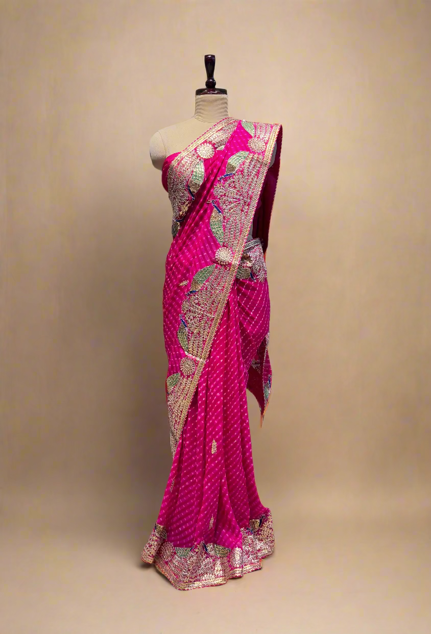 (Deliver in 30 Days) HOT PINK PURE MOTHRA LEHERIYA SAREE WITH GOTA PATTI & ZARDOZI WORK BORDER PAIRED WITH A CREPE BLOUSE