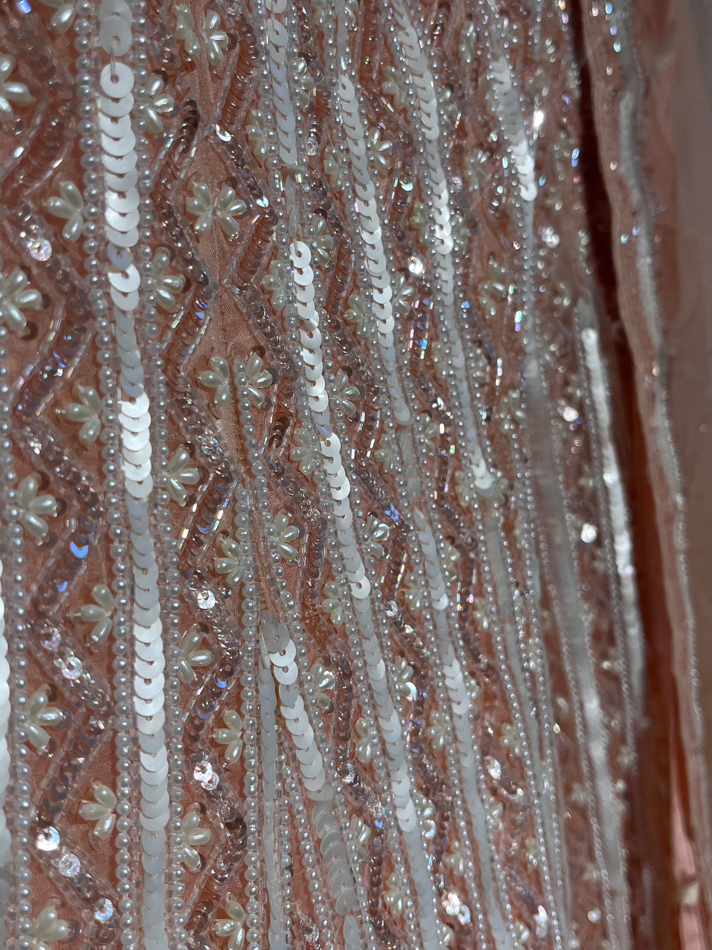PEACH COLOUR ORGANZA HAND EMBROIDERED LEHENGA EMBELLISHED WITH SEQUINS, CUTDANA WORK & UNSTITCHED BLOUSE