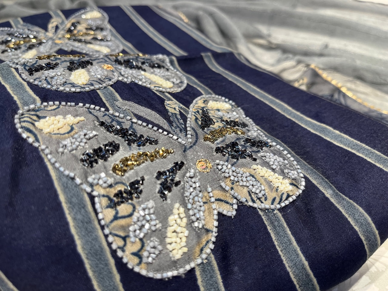 BLUE COLOUR CREPE SILK UNSTITCHED SUIT WITH CHIFFON DUPATTA EMBELLISHED WITH CUTDANA WORK