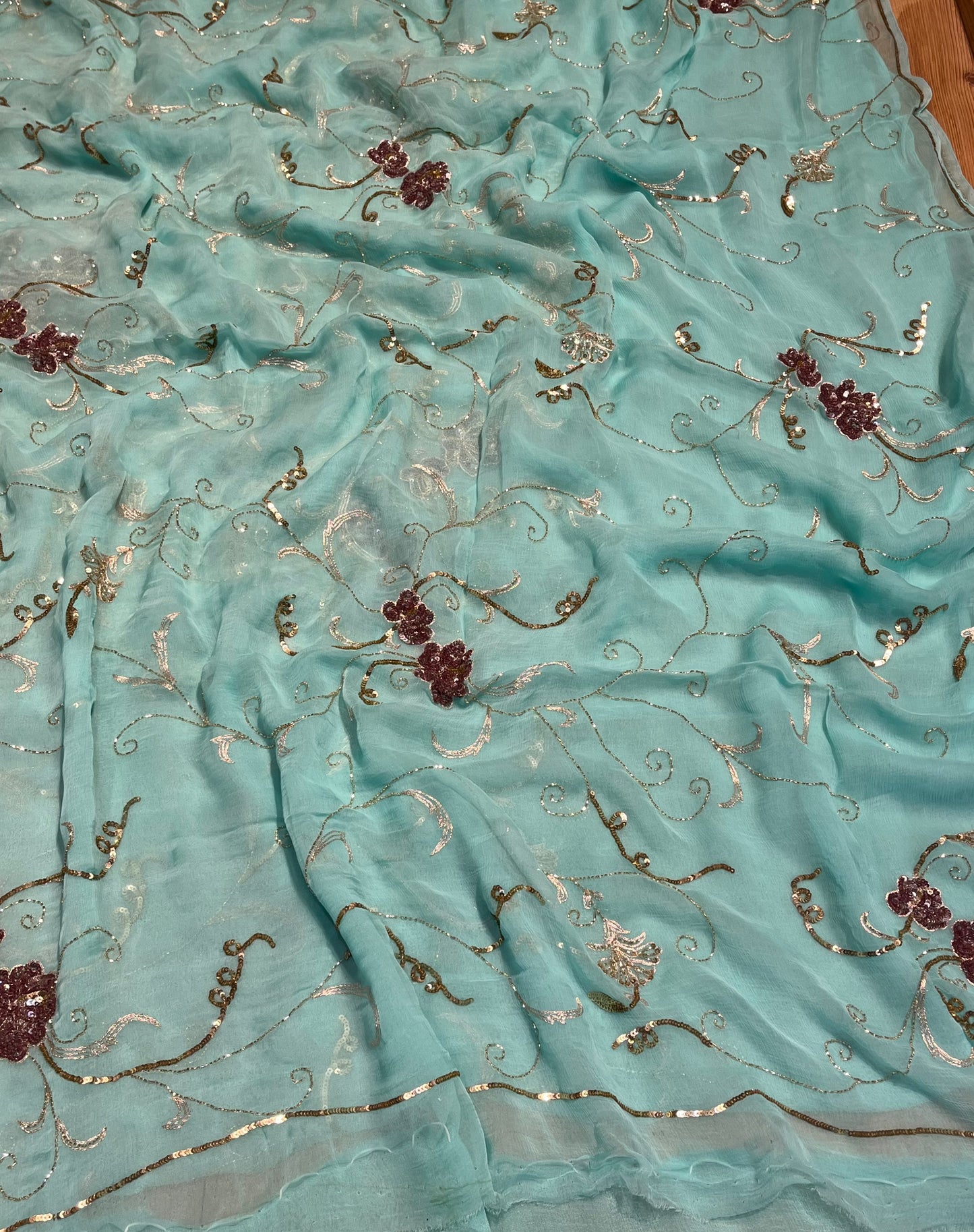 ( DELIVERY IN 20-25 DAYS ) AQUA COLOUR CHIFFON HAND EMBROIDERED SAREE EMBELLISHED WITH SEQUINS WORK