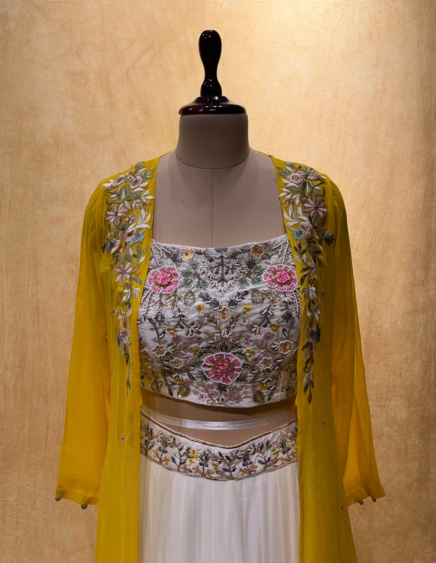 (DELIVERY IN 25 DAYS) WHITE & GREEN COLOUR GEORGETTE PALAZZO PANT WITH EMBROIDERED CROP TOP BLOUSE & SHRUG EMBELLISHED WITH RESHAM, BEADS & CUTDANA WORK