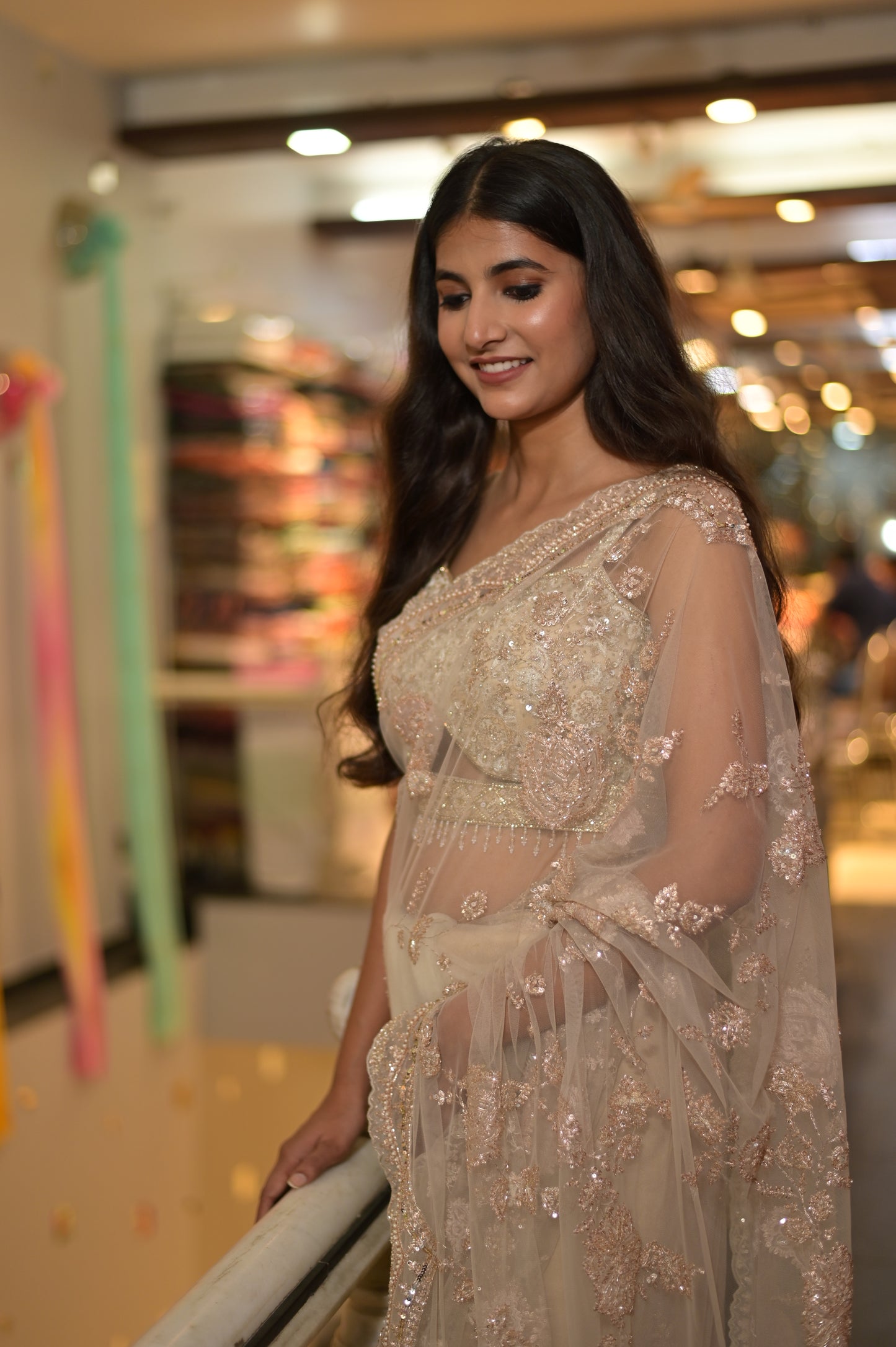 ( DELIVERY IN 25 DAYS ) BEIGE COLOUR NET HAND EMBROIDERED SAREE EMBELLISHED WITH ZARI, SEQUENCE & CUTDANA WORK