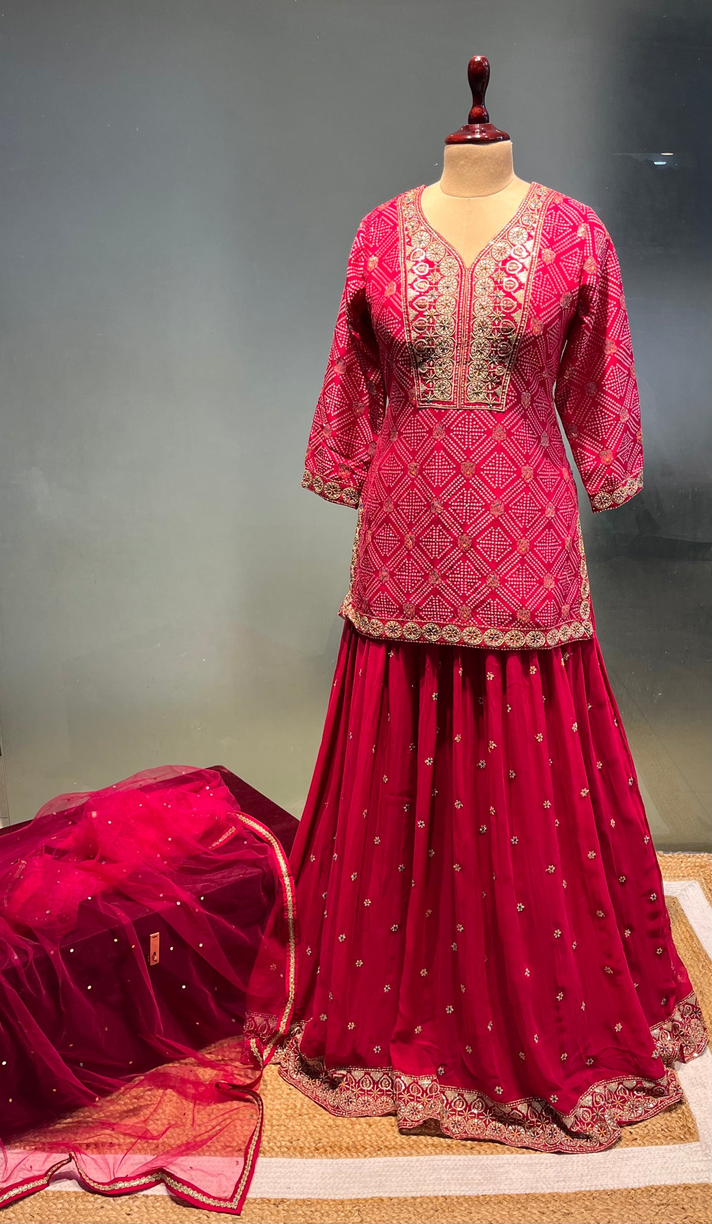 HOT PINK COLOUR DOLA SILK KURTA WITH GEORGETTE SKIRT & NET DUPATTA EMBELLISHED WITH ZARI & SEQUINS WORK