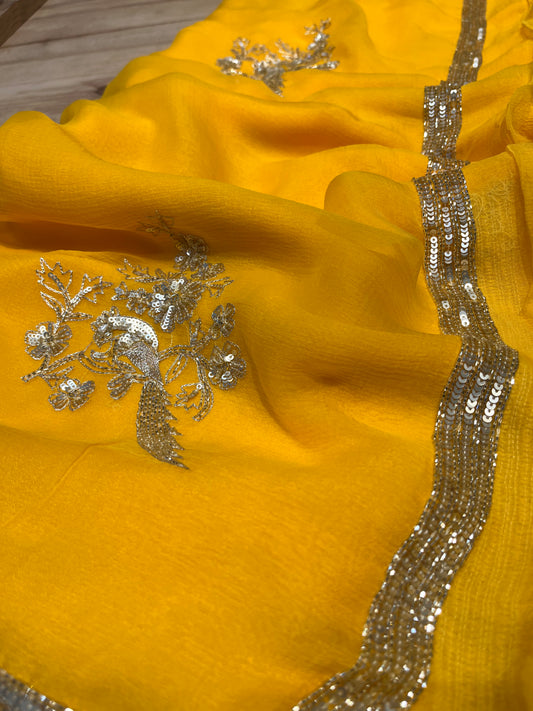 ( DELIVERY IN 20-25 DAYS ) YELLOW CHIFFON HAND EMBROIDERED SAREE EMBELLISHED WITH SEQUINS & CUTDANA WORK