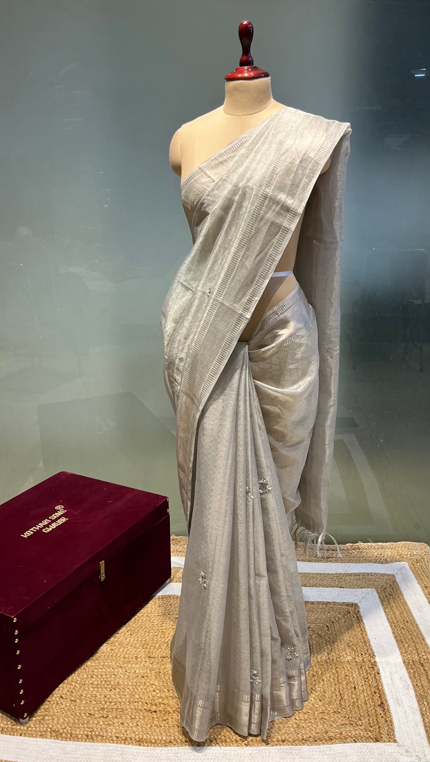 ( DELIVERY IN 25 DAYS ) SILVER COLOUR TISSUE NET HANDLOOM HAND EMBROIDERED SAREE EMBELLISHED WITH SEQUINS & BEADS WORK