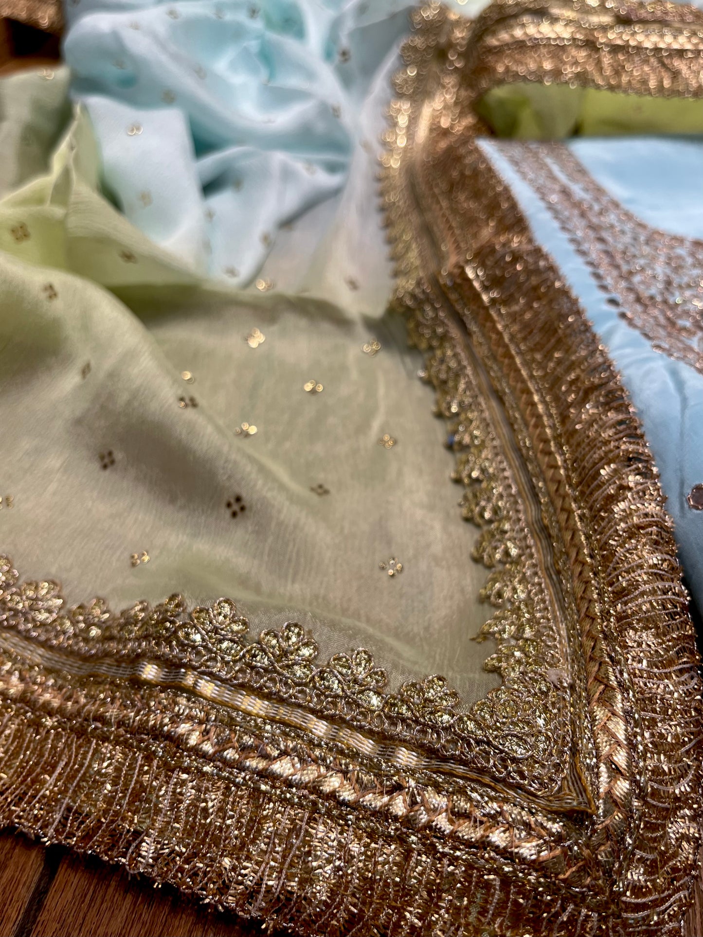 AQUA COLOUR CREPE SILK EMBROIDERED UNSTITCHED SUIT WITH CHINON SHADED DUPATTA EMBELLISHED WITH MIRROR WORK