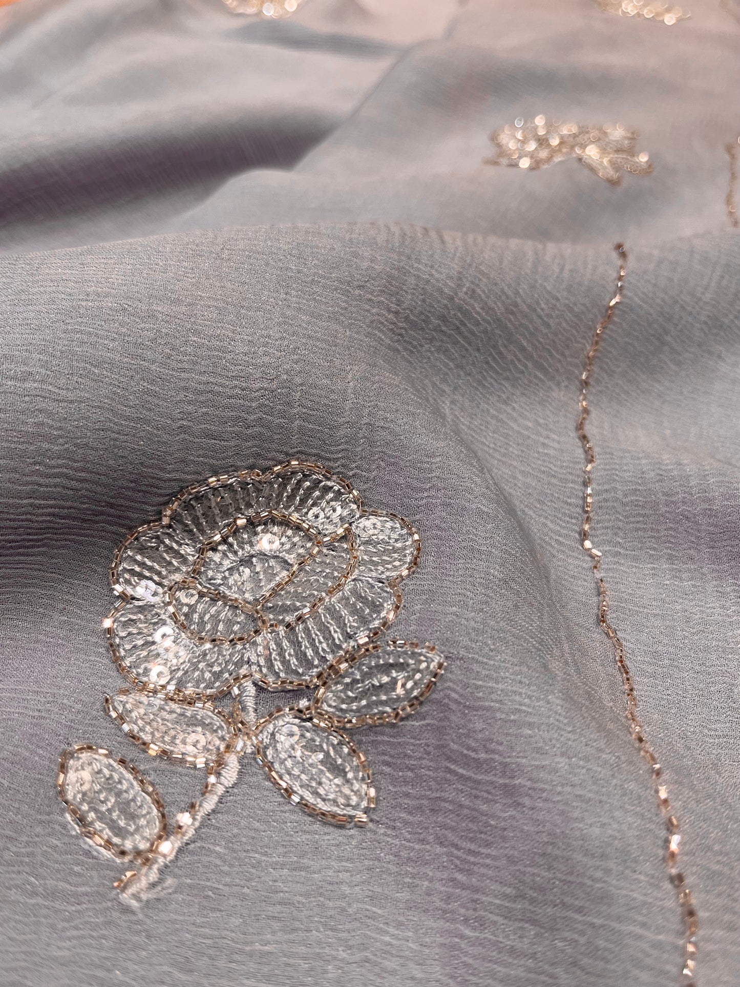 ( DELIVERY IN 30 DAYS ) GREY COLOUR CHIFFON EMBROIDERED SAREE EMBELLISHED WITH CUTDANA & SEQUINS WORK