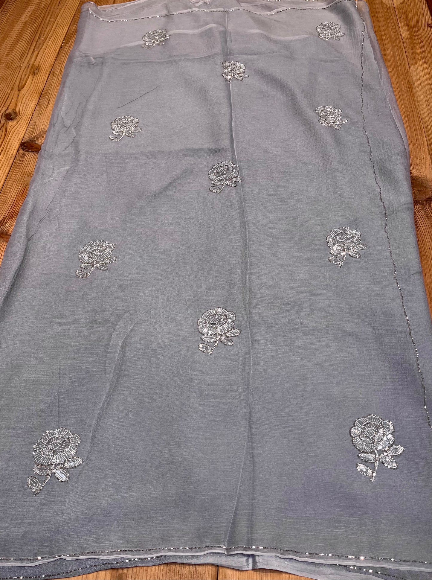 ( DELIVERY IN 30 DAYS ) GREY COLOUR CHIFFON EMBROIDERED SAREE EMBELLISHED WITH CUTDANA & SEQUINS WORK