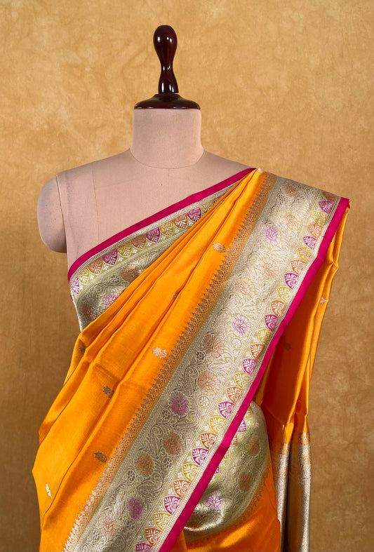 ORANGE COLOUR PURE SILK SAREE WITH CONTRAST BORDER EMBELLISHED WITH ZARI WEAVES