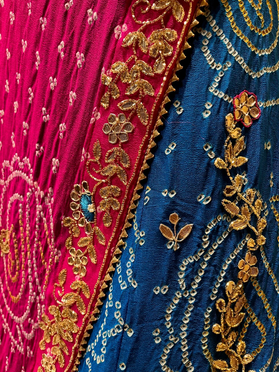 TURQUOISE COLOUR PURE GEORGETTE OJARIYA BANDHEJ LEHENGA EMBELLISHED WITH CUTDANA & GOTA PATTI WORK